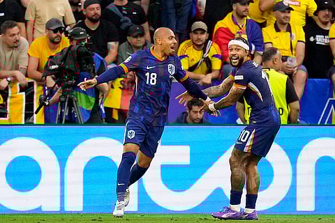 Donyell Malen celebrates after scoring Netherlands second goal